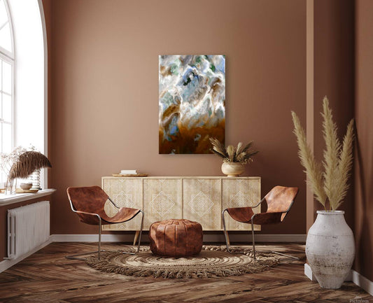 A wall art piece with a marble pattern in shades of white, blue, dark red, green, and black, displayed above a brown sofa in a well-lit room with modern decor.